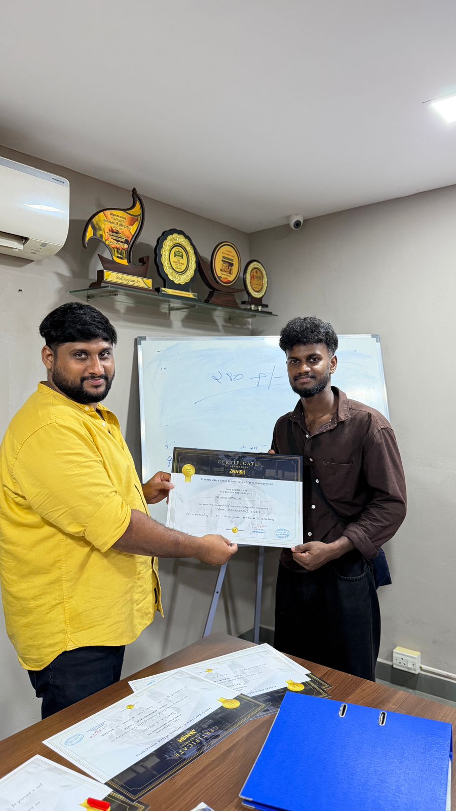 Training participants receiving certificates